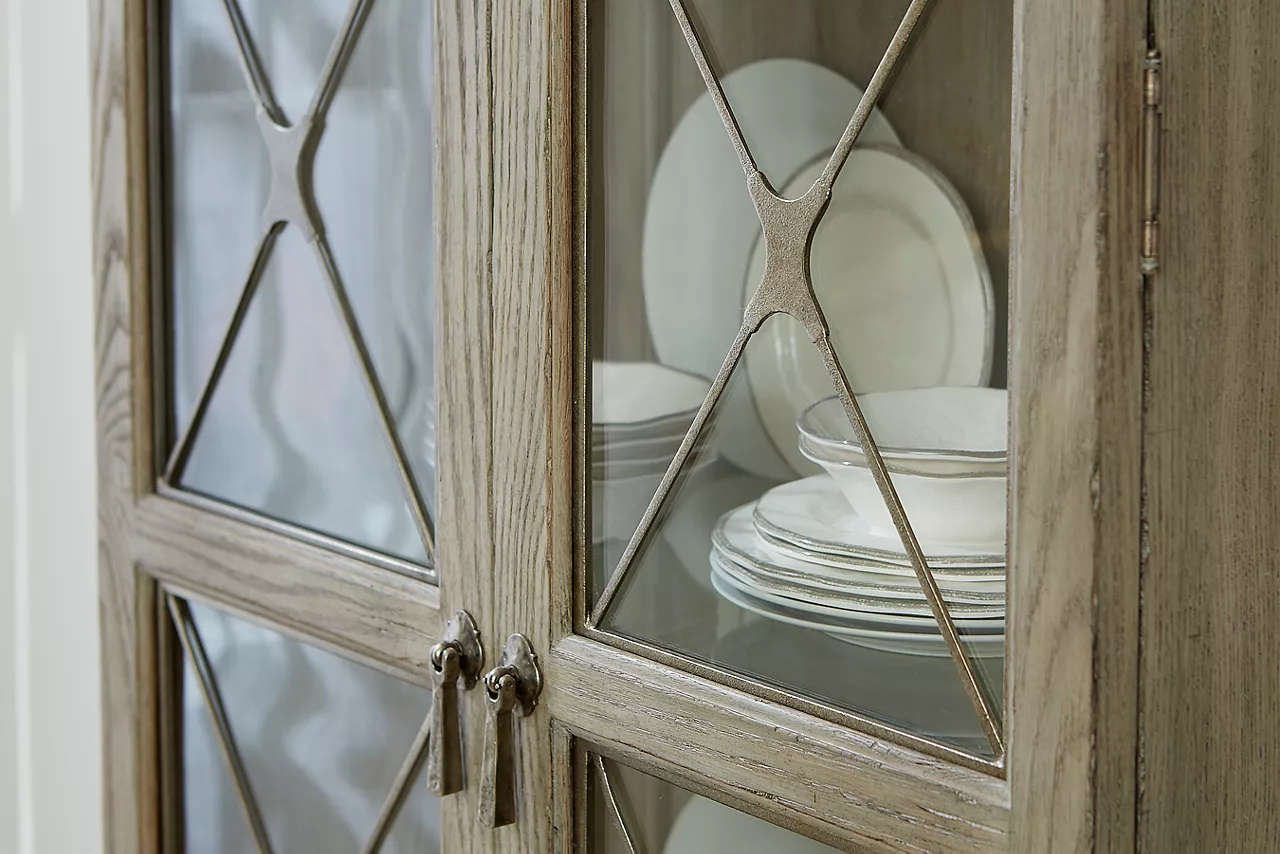 Closeup of the Candler Park Curio China in Burnished Grey in a room scene.